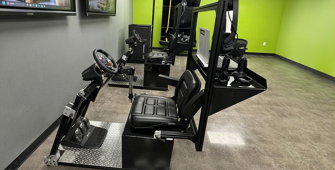 Two Classroom Standard simulator stations set up in a training room